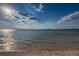 Beautiful beach with clear water and soft sand, perfect for relaxation and enjoying waterfront activities at 223 Lime S Cir, Dunedin, FL 34698