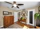 Bright bedroom with natural light and hardwood floors at 223 Lime S Cir, Dunedin, FL 34698