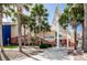 Exterior view of the Dunedin Fine Art Center with palm trees and modern architecture at 223 Lime S Cir, Dunedin, FL 34698