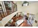 Open living room view from above features comfortable seating and natural light at 223 Lime S Cir, Dunedin, FL 34698