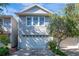Charming two-story home featuring a two-car garage and beautifully landscaped front yard at 2837 Bayshore Trails Dr, Tampa, FL 33611