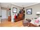 Cozy living room featuring unique shelving, hardwood floors, and stylish decorations at 2837 Bayshore Trails Dr, Tampa, FL 33611