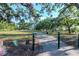 Scenic park pathway lined with lush trees and greenery offering a tranquil outdoor experience at 2837 Bayshore Trails Dr, Tampa, FL 33611