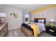 Charming bedroom with unique wall art, colorful bedding, and bright natural light at 3226 Sunrise Spring Pl, Brandon, FL 33511