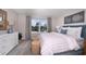 Comfortable bedroom featuring a cozy bed, soft colors, and natural light from the window at 3226 Sunrise Spring Pl, Brandon, FL 33511