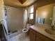 Bathroom featuring tile flooring, a shower, and a vanity with a sink at 3257 Bluestone Ave, Spring Hill, FL 34609