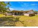 Expansive backyard featuring a screened in patio perfect for outdoor entertaining at 4061 13Th Ne Ln, St Petersburg, FL 33703