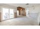 Bright living room featuring sliding glass doors ready for renovation and personalization at 4061 13Th Ne Ln, St Petersburg, FL 33703