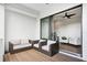 Comfortable covered balcony featuring woven seating and views into the home at 4515 W North A St # 4, Tampa, FL 33609