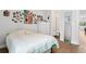 Cozy bedroom featuring a chest of drawers and an ensuite bathroom at 4515 W North A St # 4, Tampa, FL 33609