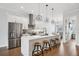 Modern kitchen with a spacious island, stainless steel appliances, and stylish pendant lighting at 4515 W North A St # 4, Tampa, FL 33609