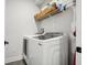 Laundry room with a modern washer and dryer and wire shelving at 4515 W North A St # 4, Tampa, FL 33609