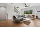 Inviting living room with hardwood floors, a comfortable sofa, and a staircase at 4515 W North A St # 4, Tampa, FL 33609