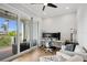 Bright office with balcony, desk setup, and comfortable seating area at 4515 W North A St # 4, Tampa, FL 33609