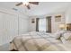 This bedroom offers a well-lit room with large closet space at 4555 Debbie Ln, Lutz, FL 33559