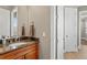 Bathroom features a granite countertop and a modern faucet fixture on the sink at 47 Martinique Ave, Tampa, FL 33606