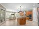 Open concept kitchen with an island, breakfast nook, and stainless steel appliances at 47 Martinique Ave, Tampa, FL 33606
