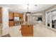 Spacious kitchen with a large island, stainless appliances, granite counters, and an open floor plan at 47 Martinique Ave, Tampa, FL 33606