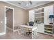 Well-lit office with built-in shelving and cabinets, providing ample storage and a dedicated workspace at 47 Martinique Ave, Tampa, FL 33606