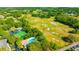 Aerial view of the golf course and community pool at 5245 Lochmead Ter, Zephyrhills, FL 33541