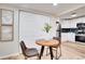 Dining area near the kitchen, featuring modern appliances, ample cabinet space, and stylish decor at 5444 70Th N Ln, St Petersburg, FL 33709
