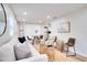 Comfortable and stylish living area provides seating, natural light, and access to the updated kitchen at 5444 70Th N Ln, St Petersburg, FL 33709
