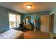 Bedroom features tile floors, a ceiling light, a window, and neutral paint at 7345 Brightwaters Ct, New Port Richey, FL 34652