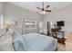 Spacious main bedroom featuring ample natural light and hardwood floors at 7417 S Morton St, Tampa, FL 33616