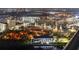 Breathtaking aerial view of a cityscape at night with illuminated buildings and waterfront at 777 N Ashley Dr # 2610, Tampa, FL 33602