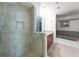 Bathroom with glass shower, granite countertops and a soaking tub at 777 N Ashley Dr # 2610, Tampa, FL 33602