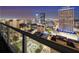 Stunning city view at night from balcony with glass railings and cityscape views at 777 N Ashley Dr # 2610, Tampa, FL 33602