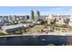 Aerial view of downtown with modern buildings, a park and water view under a blue sky at 777 N Ashley Dr # 2610, Tampa, FL 33602