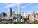 Exterior aerial view showcasing the building's modern architecture within a city skyline at 777 N Ashley Dr # 2610, Tampa, FL 33602