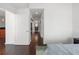 Hallway with wood floors leading to bathroom and other rooms with doors at 777 N Ashley Dr # 2610, Tampa, FL 33602
