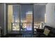 Condo living room with a balcony offering great city views at night at 777 N Ashley Dr # 2610, Tampa, FL 33602