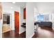Open-concept interior with hardwood floors, a modern kitchen, and views of the city at 777 N Ashley Dr # 2610, Tampa, FL 33602