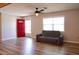 Living area featuring new flooring, neutral colors, and plenty of natural light at 7827 Crosier Ct, New Port Richey, FL 34653