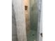 Updated bathroom with mosaic tile shower, marble accent wall and built-in niche at 7912 Causeway S Blvd, St Petersburg, FL 33707