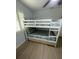 Comfortable bedroom with bunk beds, providing a cozy and functional space at 7912 Causeway S Blvd, St Petersburg, FL 33707