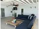 Outdoor patio featuring a bar, grill and comfortable seating at 7912 Causeway S Blvd, St Petersburg, FL 33707