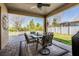Enjoy outdoor dining on this covered back patio with brick pavers, and a ceiling fan at 8247 Westhaven Dr, Land O Lakes, FL 34638