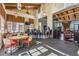 The clubhouse features tables and seating, a bar area, and large windows offering plenty of natural light at 8247 Westhaven Dr, Land O Lakes, FL 34638