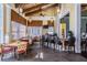 The clubhouse features tables and seating, a bar area, and large windows offering plenty of natural light at 8247 Westhaven Dr, Land O Lakes, FL 34638