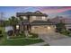 Beautiful two-story home with a three-car garage and well-maintained landscaping at 8247 Westhaven Dr, Land O Lakes, FL 34638