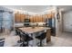 Well-appointed kitchen featuring a central island with barstool seating and stainless steel appliances at 8247 Westhaven Dr, Land O Lakes, FL 34638