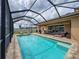 The pool features steps for easy entry, a relaxing atmosphere, and a clean, inviting design at 8578 Gibbons Grove Loop, Land O Lakes, FL 34637