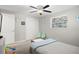 Bedroom featuring ceiling fan, window and twin-size bed at 8766 91St St, Seminole, FL 33777