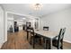Open dining room with views to the kitchen and living room at 8766 91St St, Seminole, FL 33777