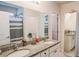 Bathroom featuring double sinks, granite countertops, and a shower/tub combination at 901 Golden Shiner Ave, Ruskin, FL 33570