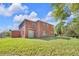 Large backyard features a well-maintained lawn at 9102 Kentucky Day Ct, Gibsonton, FL 33534